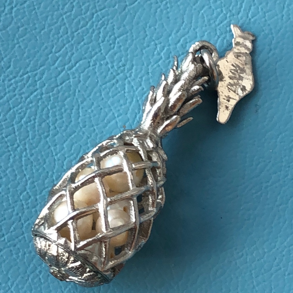 Hawaii pineapple basket filled with pearls pendant-sterling?